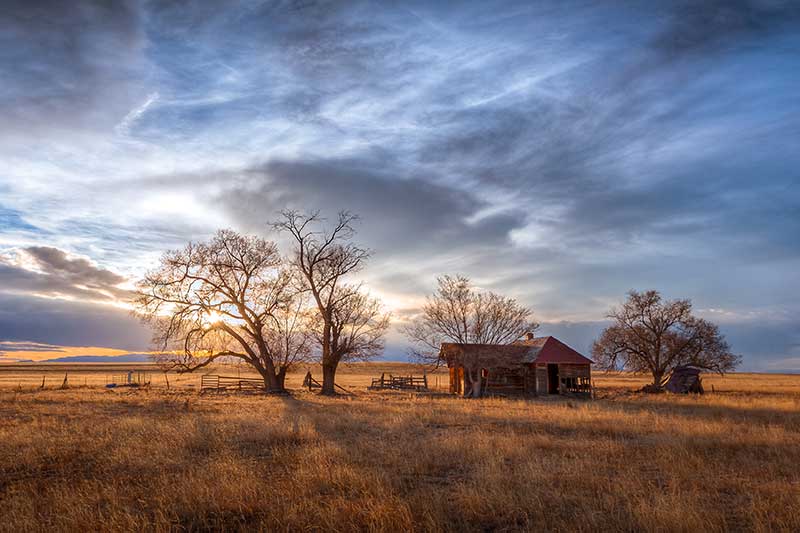 Old Farmhouse at Sunset on the Great Plains